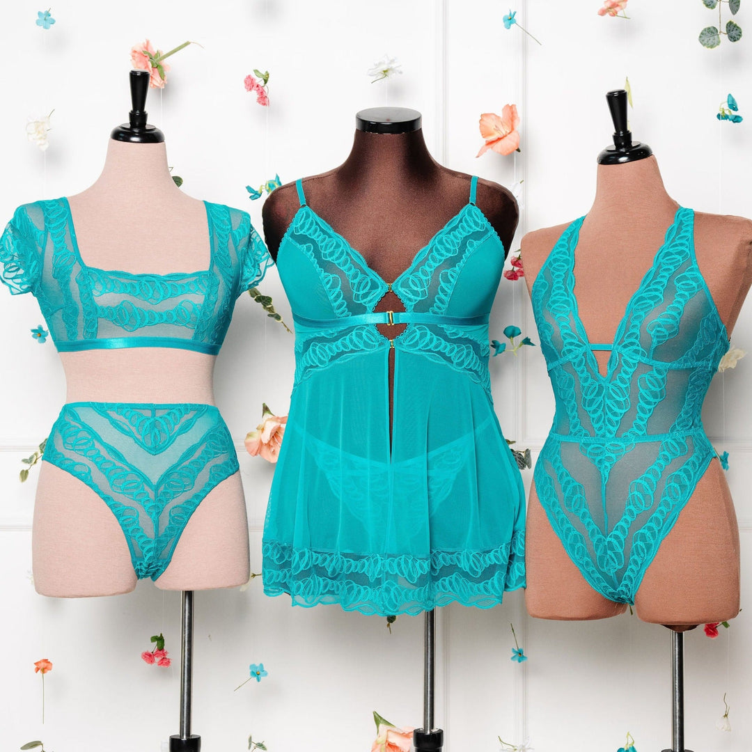 Sexy aqua/turquoise cheeky sold lace bodysuit